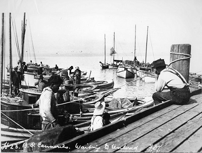 Men Sitting on a Fishing Dock, BC. 1913. JCCC Original Photographic Collection. Japanese Canadian Cultural Centre. 2001.12.43.