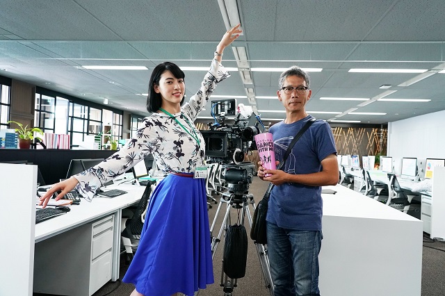 woman dancing in office