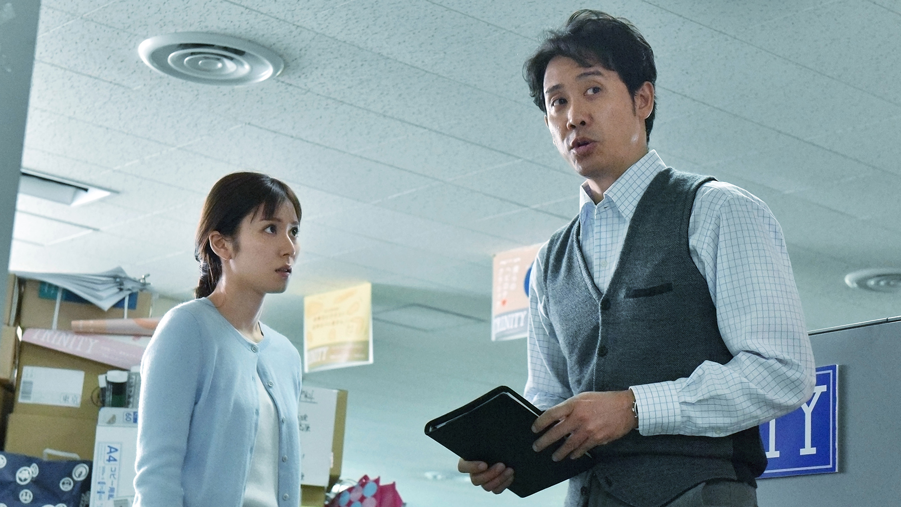 man and woman in conversation