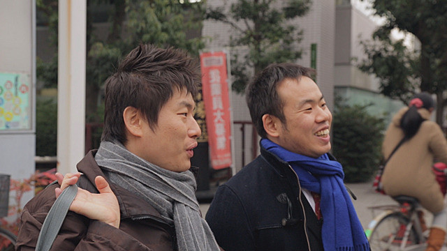 two men smiling