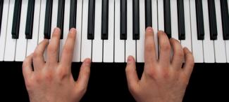 Person playing keyboard