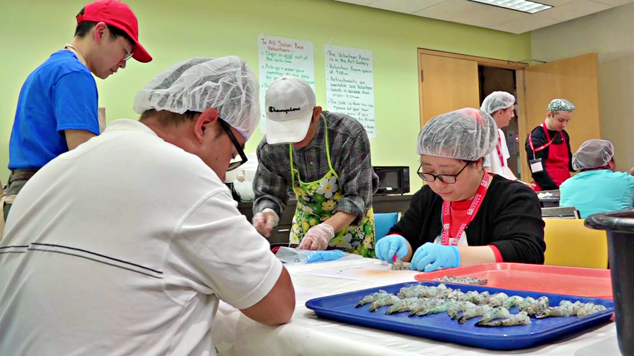 Volunteers preparing foods