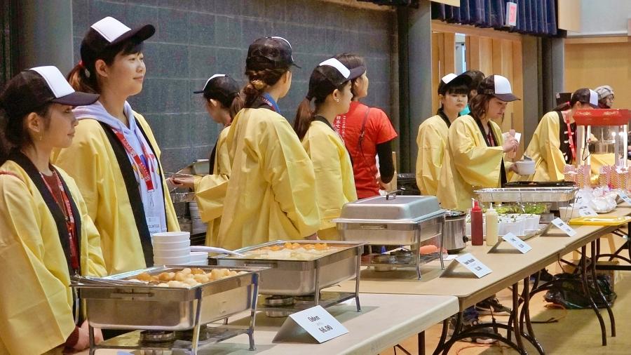 Volunteers at food serving booth