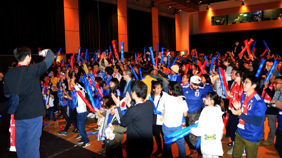 Fans cheer on Japan