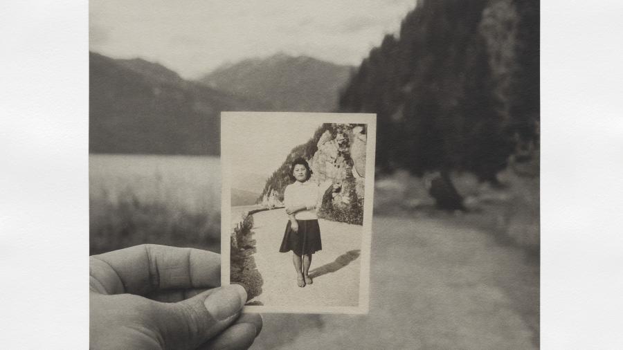 historical polaroid image held up to it's current spot