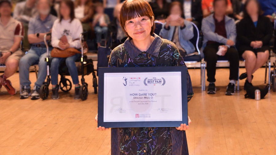 Director Mipo O accepts the Toronto Japanese Film Festival’s Grand Jury Prize for Best Film