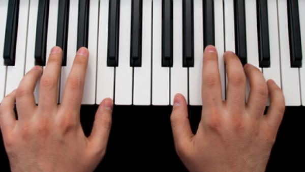 Person playing keyboard